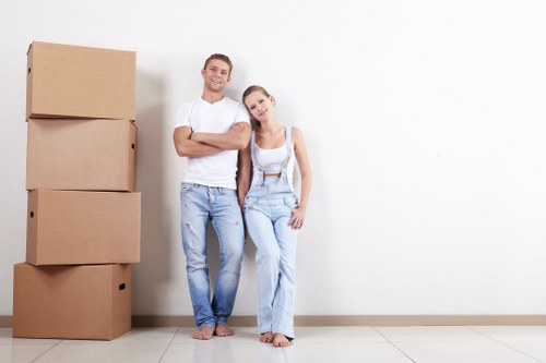 Man And Van Holloway team preparing safely with insured moving equipment