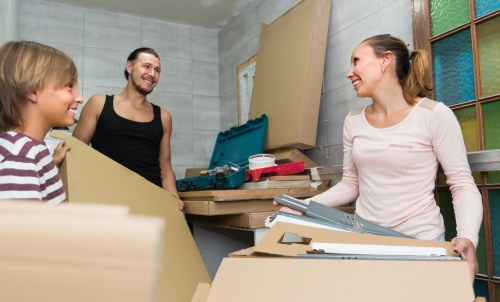 Student removals team handling boxes in a Holloway residential street