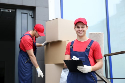 Professional moving service handling household items in Holloway