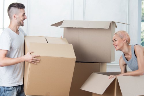 Packed moving boxes and furniture ready for house removals in Holloway