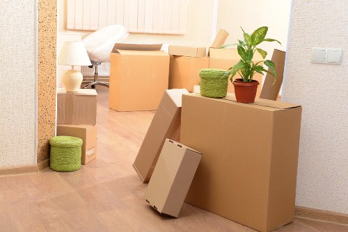 Professional movers handling furniture during a same day move