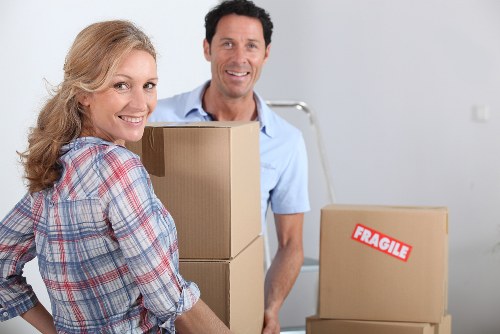 Flat removal service in Holloway with boxes and packing items